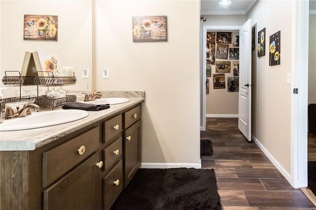 5618 Bowen Rd, Blackshear, GA 31516 - bathroom with double vanity and wood finished floors