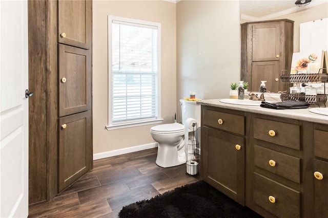 5618 Bowen Rd, Blackshear, GA 31516 - bathroom with vanity, wood finished floors, and crown molding