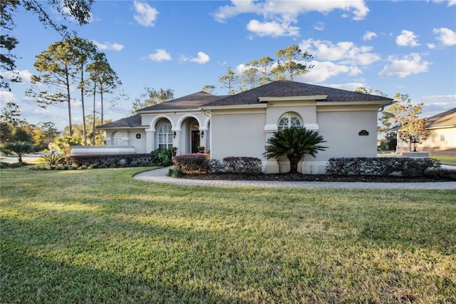 view of front of house with a front yard