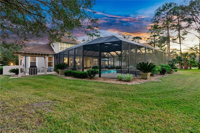 yard at dusk with glass enclosure