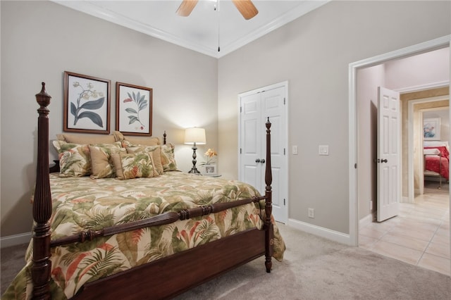 carpeted bedroom with ceiling fan and crown molding