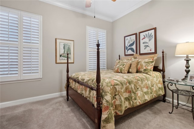 bedroom with ceiling fan, crown molding, and light colored carpet