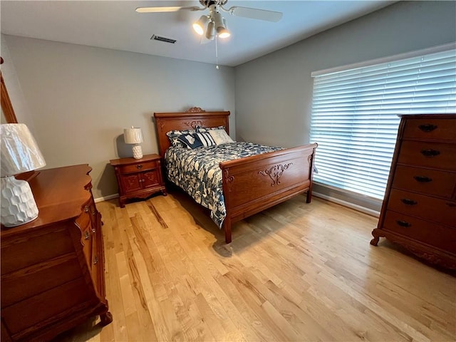 145 Shore Rush Dr, Saint Simons Island, GA 31522 - bedroom featuring light wood finished floors and ceiling fan
