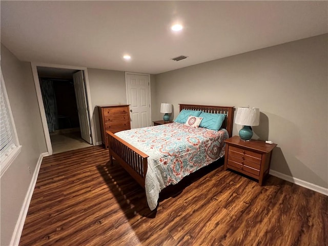 145 Shore Rush Dr, Saint Simons Island, GA 31522 - bedroom with wood finished floors and recessed lighting