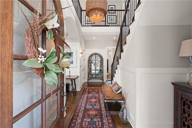 entrance foyer with dark hardwood / wood-style flooring