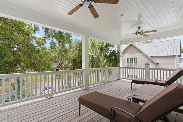 wooden deck with ceiling fan