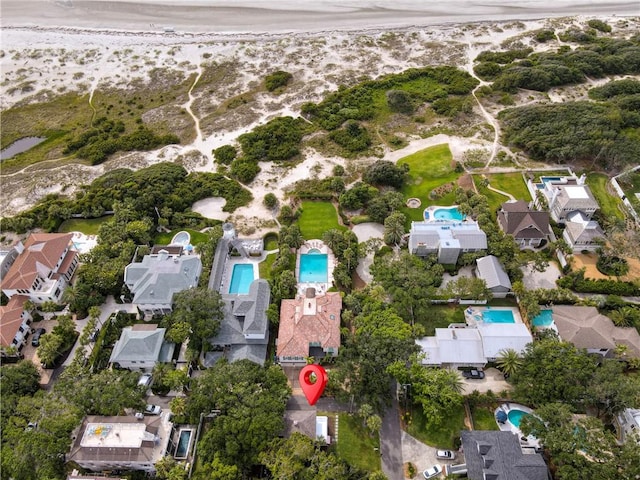 4206 Tenth St, Saint Simons Island, GA 31522 - aerial view of property and surrounding area with a pool and nearby suburban area