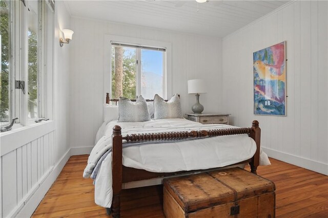 4206 Tenth St, Saint Simons Island, GA 31522 - bedroom featuring light wood-type flooring, ornamental molding, and baseboards