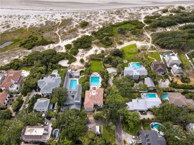 4206 Tenth St, Saint Simons Island, GA 31522 - aerial view of property's location featuring a pool and nearby suburban area