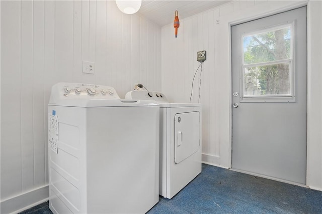 4206 Tenth St, Saint Simons Island, GA 31522 - laundry area with separate washer and dryer and wooden walls