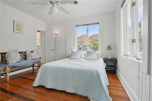 4206 Tenth St, Saint Simons Island, GA 31522 - bedroom with wood finished floors, ornamental molding, and ceiling fan