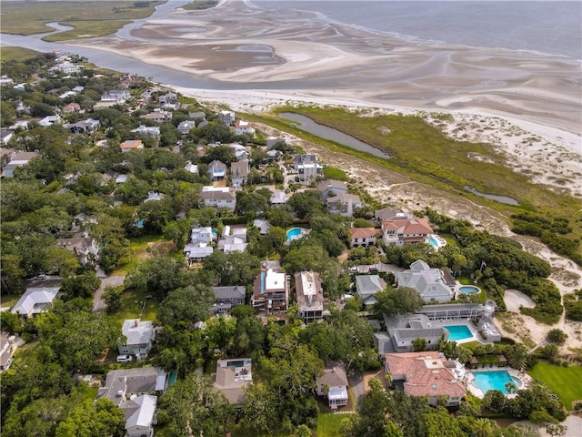4206 Tenth St, Saint Simons Island, GA 31522 - aerial view of property's location featuring nearby suburban area, a pool area, and a nearby body of water