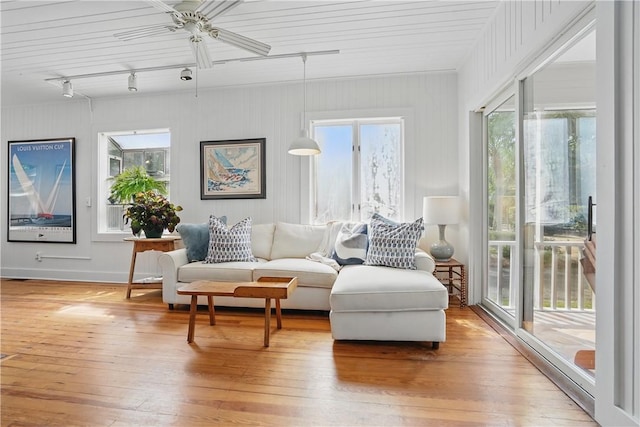 4206 Tenth St, Saint Simons Island, GA 31522 - living area featuring track lighting, a ceiling fan, and light wood-type flooring