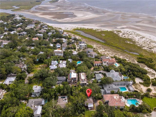 4206 Tenth St, Saint Simons Island, GA 31522 - aerial view of property and surrounding area featuring nearby suburban area, a pool area, and a nearby body of water