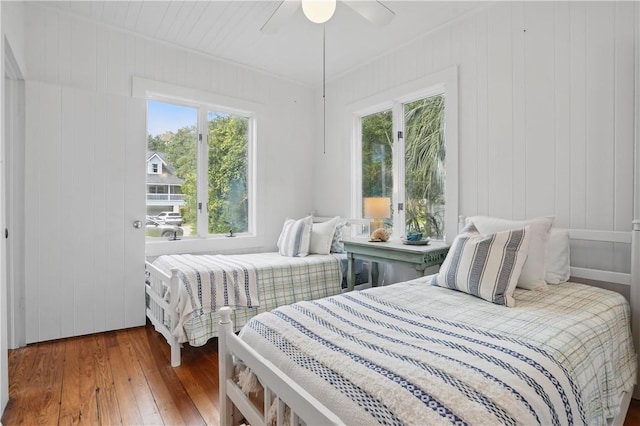 4206 Tenth St, Saint Simons Island, GA 31522 - bedroom with hardwood / wood-style flooring and a ceiling fan
