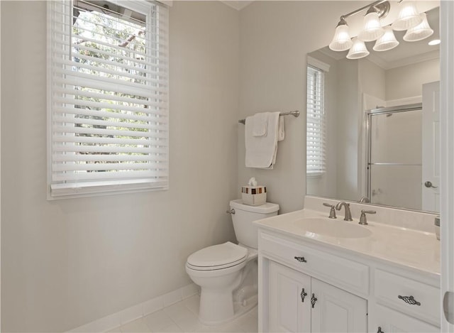 bathroom with vanity, crown molding, tile patterned flooring, toilet, and an enclosed shower