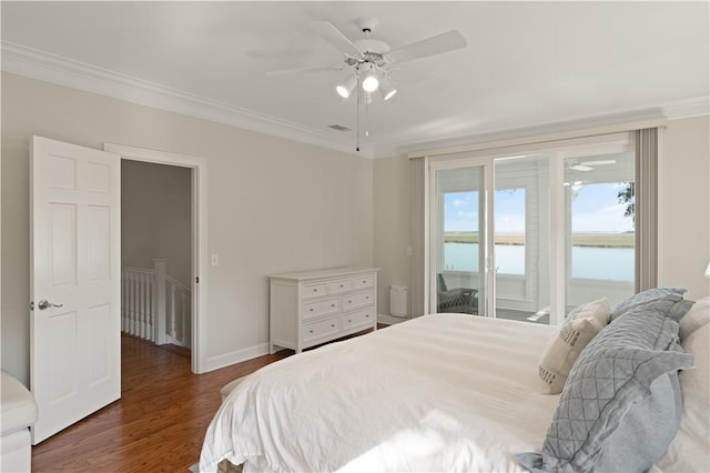 bedroom with access to exterior, dark hardwood / wood-style flooring, ceiling fan, crown molding, and a water view