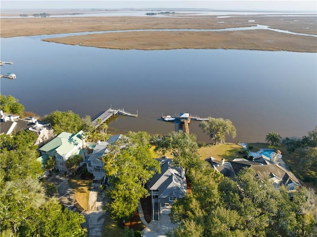 drone / aerial view with a water view