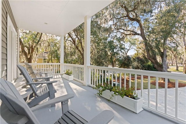 balcony featuring a porch