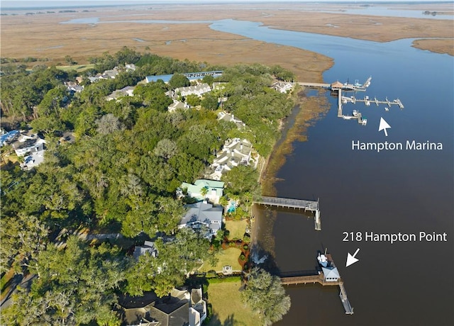 birds eye view of property featuring a water view