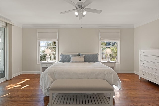 bedroom featuring ceiling fan, dark hardwood / wood-style floors, and multiple windows