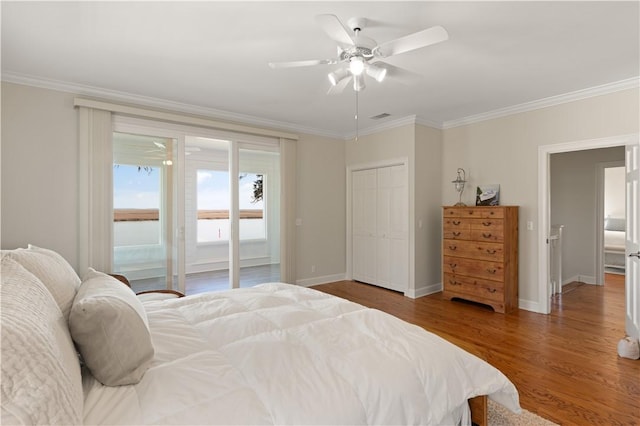 bedroom featuring wood-type flooring, access to outside, ceiling fan, and crown molding