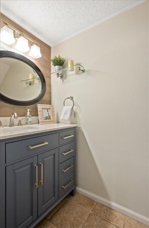 bathroom featuring vanity and a textured ceiling