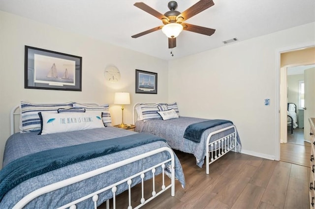 bedroom featuring hardwood / wood-style flooring and ceiling fan