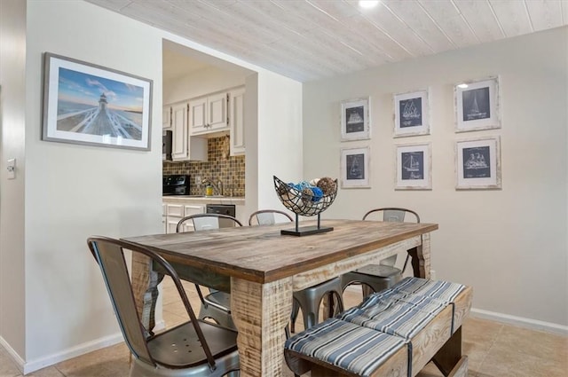 tiled dining room with wooden ceiling