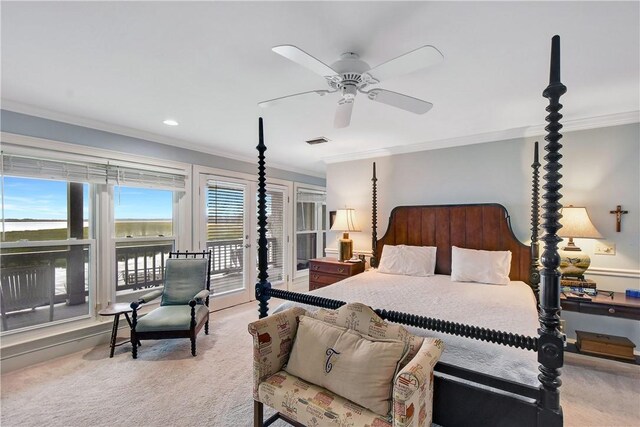 carpeted bedroom with access to outside, ceiling fan, and ornamental molding