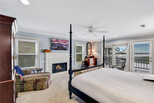 bedroom featuring carpet flooring, ceiling fan, access to exterior, and crown molding