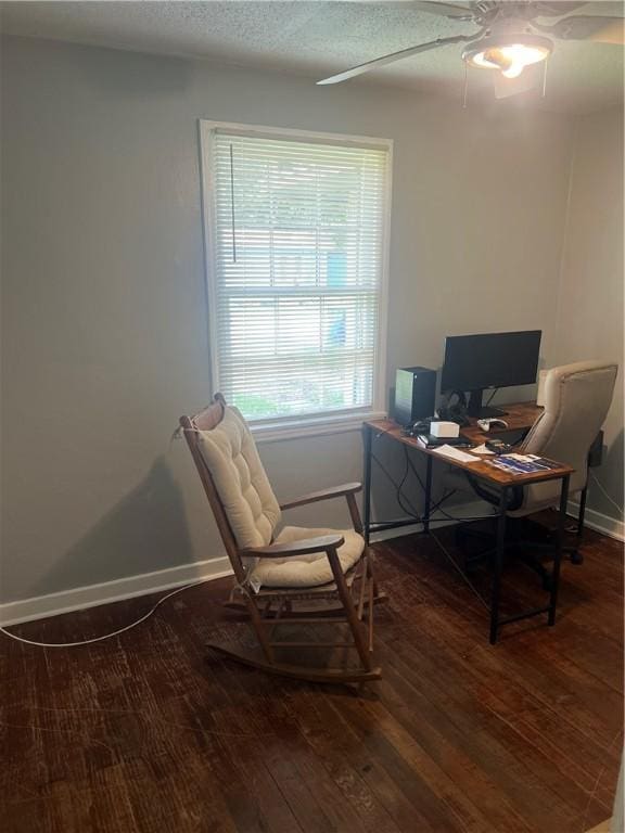 3228 Reynolds St, Brunswick, GA 31520 - office area featuring wood finished floors, baseboards, and a ceiling fan