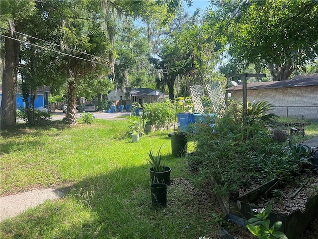 3228 Reynolds St, Brunswick, GA 31520 - view of yard featuring fence