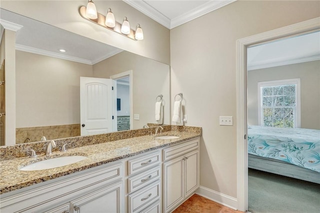 bathroom with tile patterned flooring, vanity, and crown molding