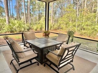 sunroom / solarium with a wealth of natural light