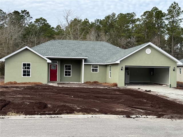 single story home with a garage