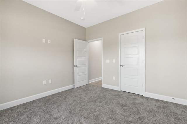 unfurnished bedroom with carpet and ceiling fan