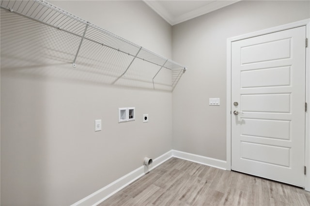 laundry room with light wood-type flooring, hookup for an electric dryer, ornamental molding, and hookup for a washing machine