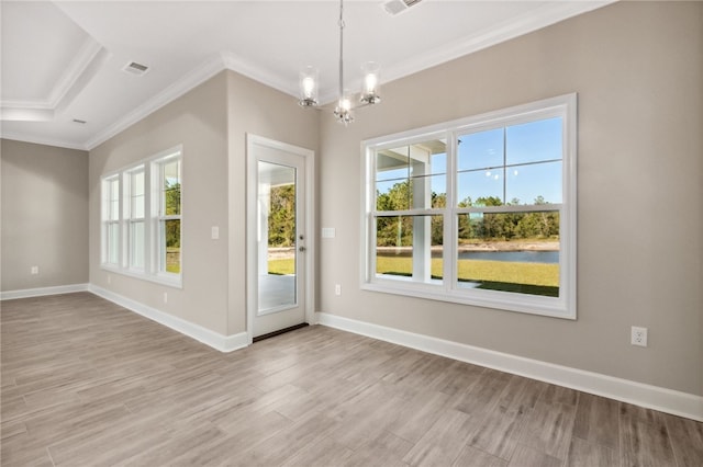 doorway to outside with an inviting chandelier, light hardwood / wood-style flooring, and crown molding