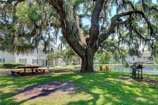 850 Mallery St Unit J-14, Saint Simons Island, GA 31522 - surrounding community with a lawn and a water view