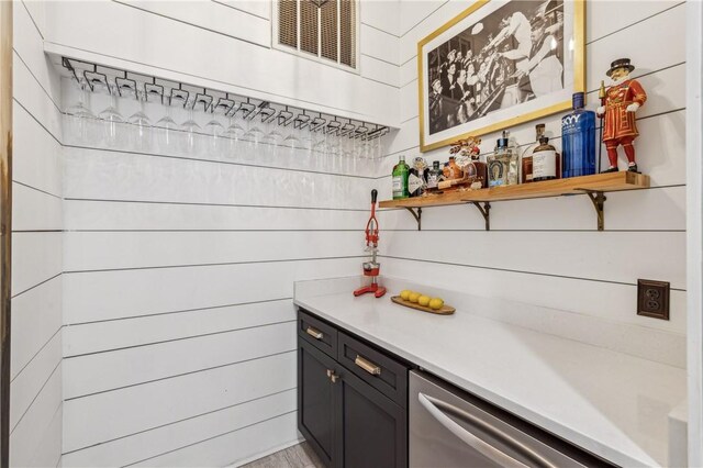 1232 Riverpoint Ln NE, Townsend, GA 31331 - bar area featuring stainless steel dishwasher