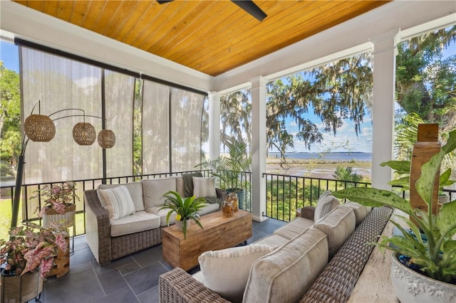 1232 Riverpoint Ln NE, Townsend, GA 31331 - sunroom / solarium featuring an outdoor hangout area, ceiling fan, and plenty of natural light