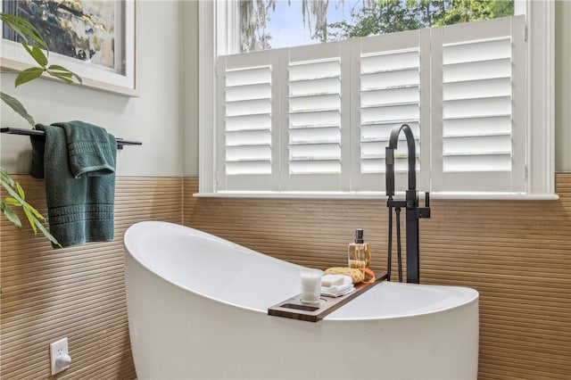 1232 Riverpoint Ln NE, Townsend, GA 31331 - bathroom featuring a soaking tub