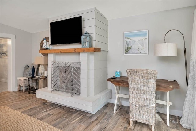 dining space with hardwood / wood-style floors