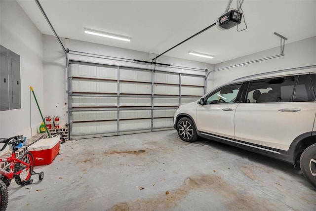 garage featuring a garage door opener