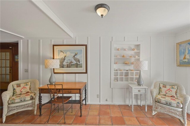 sitting room featuring light tile patterned floors