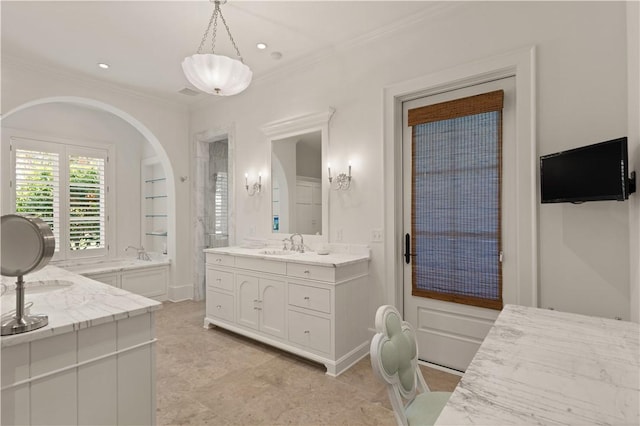 bathroom with vanity and crown molding