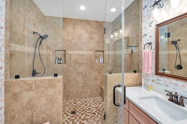 bathroom featuring vanity and walk in shower