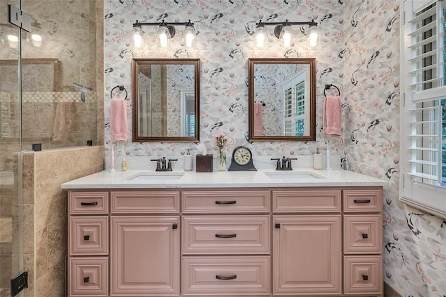 bathroom featuring vanity and a shower with shower door