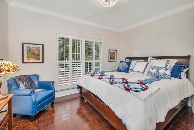 bedroom with crown molding and a chandelier